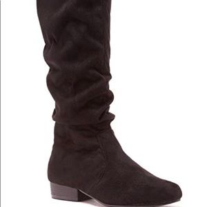 Black knee high boots.